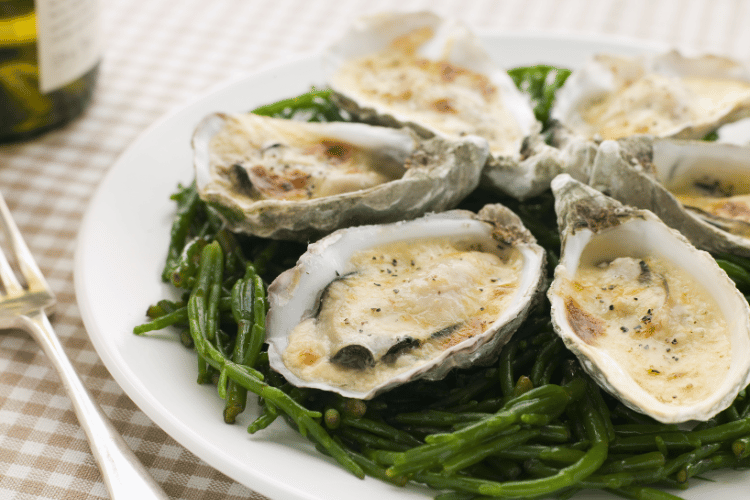 Grilled Oysters with Mornay Sauce on Samphire