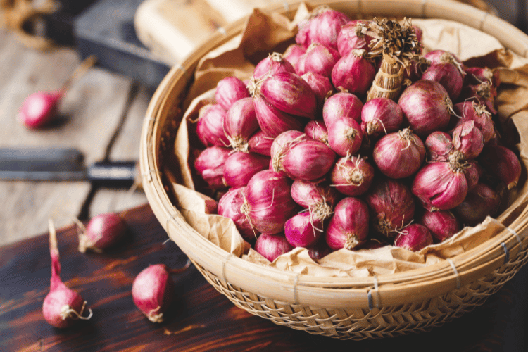 Shallots-Onions in a wooden basket