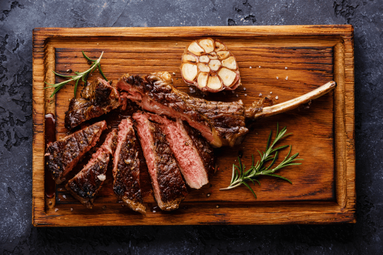 Sliced steak on bone veal rib