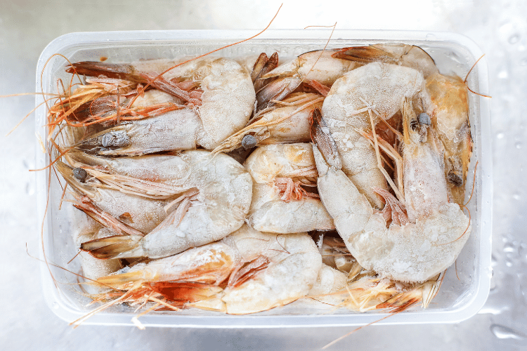 Top view of frozen shrimp in a package box