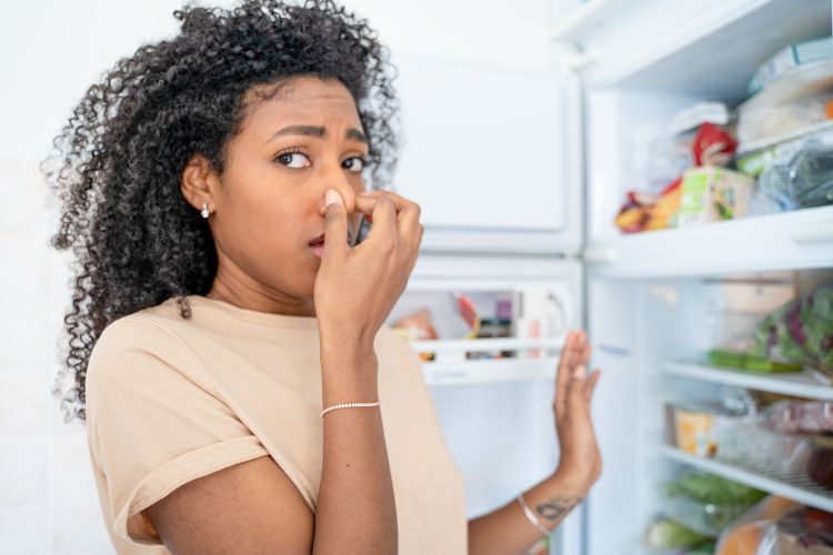 Woman disgusted at smelling stinky